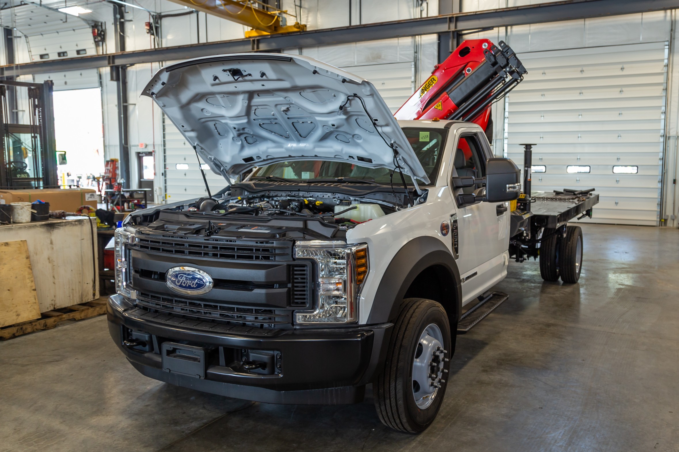 Ford truck with hood up